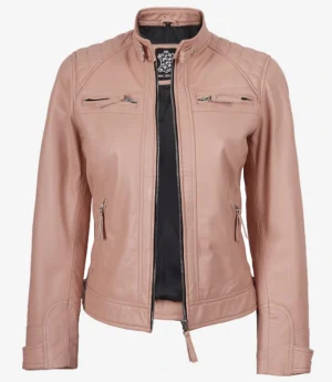 A blush pink leather jacket with a front zipper, standing collar, and quilted shoulder details. Two chest and two side zip pockets add functionality.