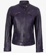 Purple leather jacket with a front zip, quilted shoulders, and zippered chest pockets. It has a sleek, trendy appearance with a slightly shiny finish.