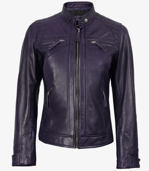 Purple leather jacket with a front zip, quilted shoulders, and zippered chest pockets. It has a sleek, trendy appearance with a slightly shiny finish.