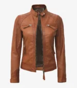 Brown leather jacket with a high collar and zippered pockets on the chest and sides. The sleek design conveys a modern and stylish tone.