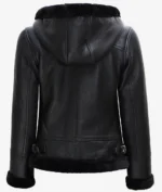 Black leather jacket with a plush hood and trim, viewed from the back. Features buckled straps at the hem and smooth, sleek texture.