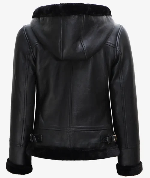 Black leather jacket with a plush hood and trim, viewed from the back. Features buckled straps at the hem and smooth, sleek texture.