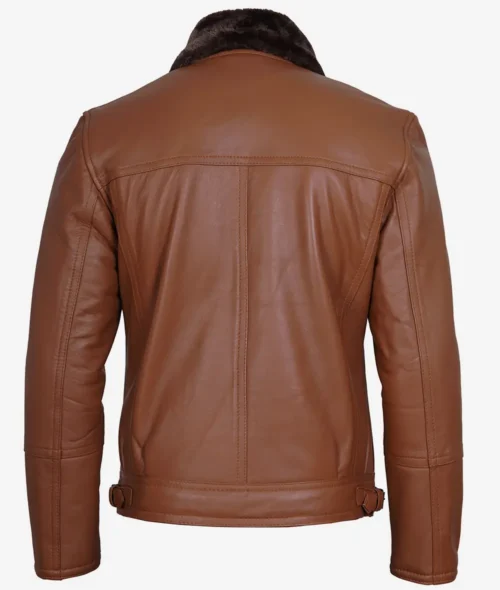 Brown leather jacket with a plush dark collar shown from the back. The jacket has subtle seam details and adjustable side buckles, conveying a classic style.