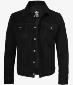 A black suede jacket with a classic design, featuring metal buttons down the front and two chest pockets. The jacket has a sleek, modern look.