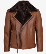 Brown leather jacket with dark fur lining, featuring an asymmetrical zipper and collar. The jacket gives a stylish and cozy appearance.