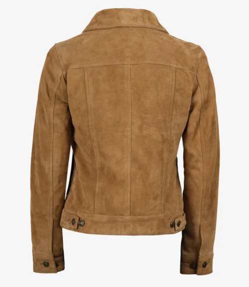 Brown suede jacket seen from the back, featuring a classic collar, paneled stitching, and buttoned cuffs. The texture is smooth, conveying elegance.