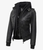 Black leather jacket with a detachable hood, multiple zippers, and button details, exuding a stylish and edgy look, perfect for casual wear.