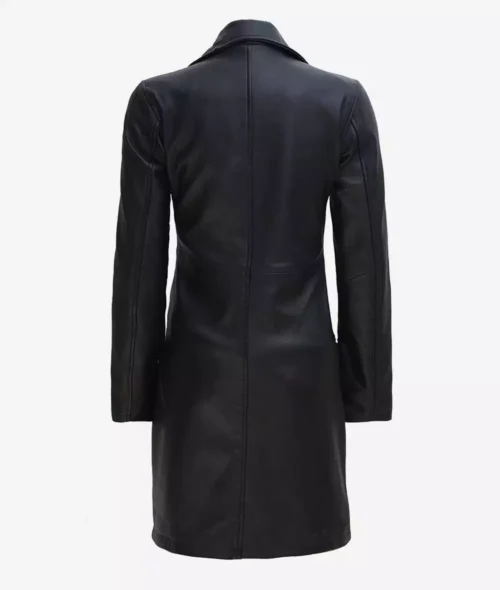 Back view of a long black leather coat with a sleek design and a high collar. The material is smooth, conveying a sophisticated and stylish tone.