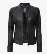 Black leather jacket with a sleek design, featuring a stand-up collar and front zipper. The front has zippered pockets and a smooth finish.