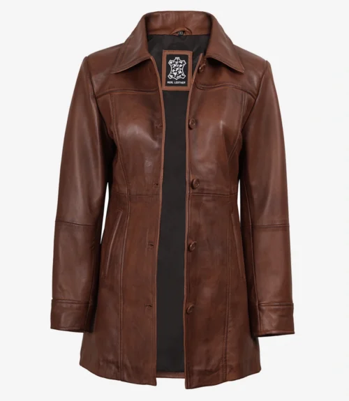 Brown leather coat with a tailored fit and large collar, featuring a row of buttons down the front. The interior is lined in black, giving a classic and stylish appearance.
