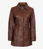 A brown leather jacket with a smooth texture and classic design, featuring a collar, long sleeves, and button closure. The tone is stylish and vintage.